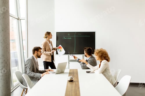 Preview: Multiethnic young business people working together in the office