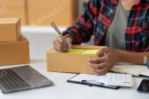 Preview: African american young woman startup business concept ecommerce business owner online on laptop Work