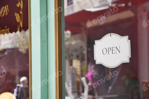 Preview: open text on paper hanging on cafe door