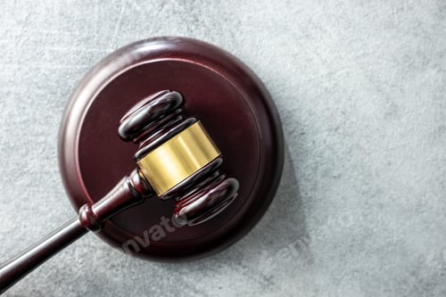 Preview: Judge gavel and rusty background.