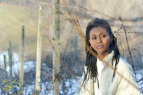Preview: stylish black young woman model wear winter elegant clothing stands confidently in snowy landscape