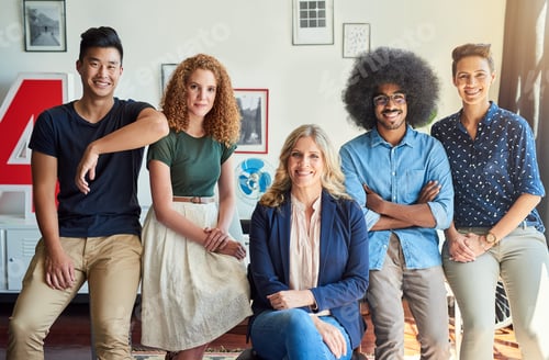 Preview: The cool creative team. Portrait of a group of diverse creative employees in a modern office.