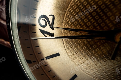 Preview: Old metal watch dial in dark macro photo