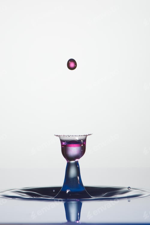Preview: Splash of colorful liquid with high speed flash