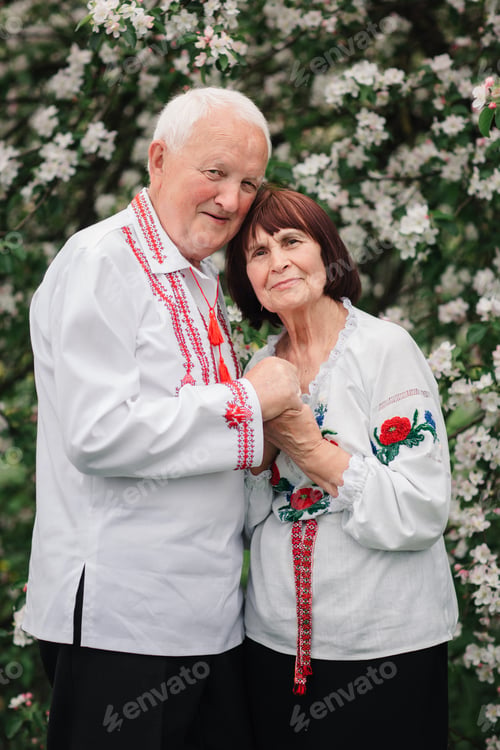 Preview: Love story of an old married couple.Beautiful couple in the national embroidered shirt of Ukrainian