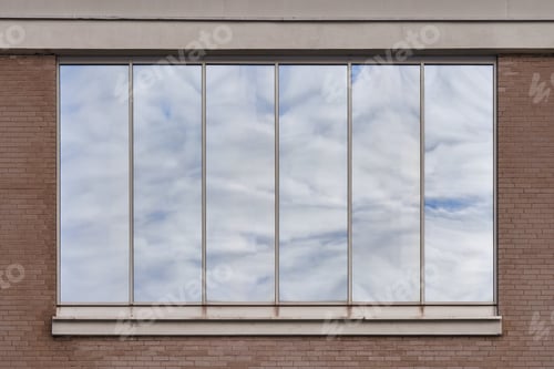 Preview: Window with reflection of clouds.