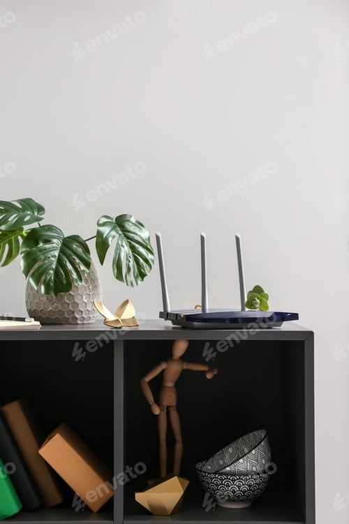 Preview: Modern Wi-Fi Router On Dark Shelf