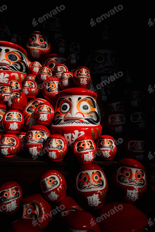 Preview: Traditional Japanese Daruma Dolls in Dim Light