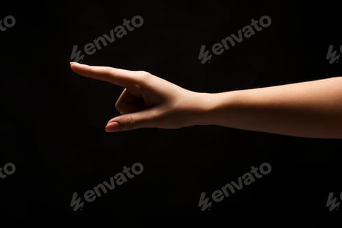Preview: Hand gestures - woman pointing, isolated at black