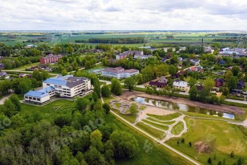 Preview: view from above to the small Latvian town Auce, two schools, a bicycle track and a residential area
