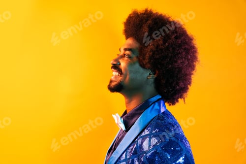Preview: African man portrait in studio on colorful background