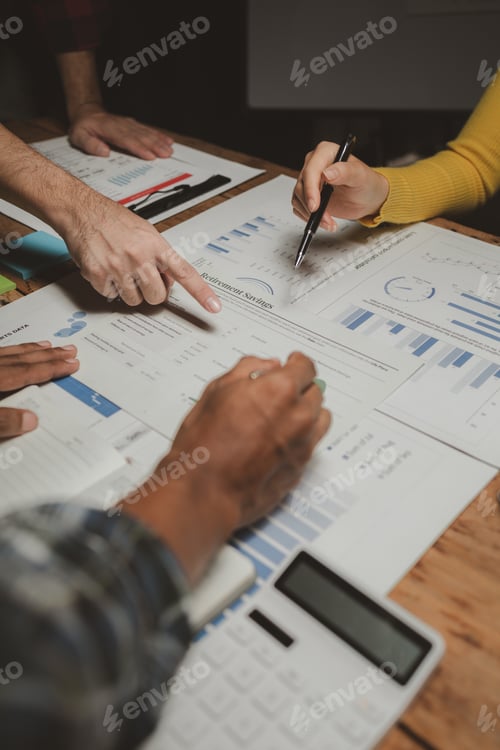 Preview: Group of businessmen working together to calculate income, They are revising the financial numbers,