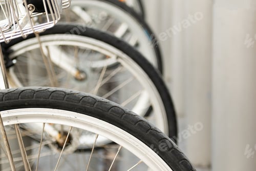Preview: Closeup shot of bicycle wheels next each other