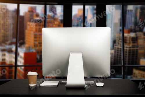 Preview: Workspace computer putting on wood working desk and surrounded by coffee cup, clipboard,