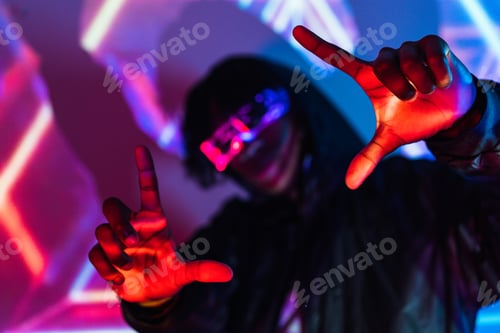 Preview: Futuristic man picturing the future gesturing with hands