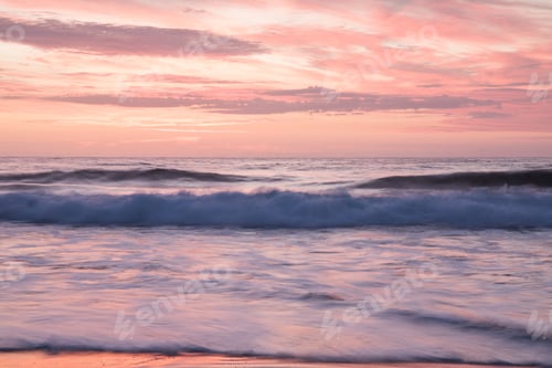 Preview: Sunrise over slow motion blurred water