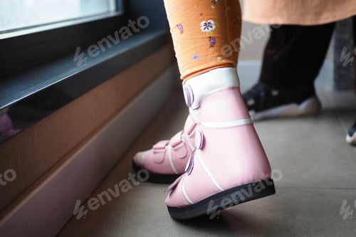 Preview: Child cerebral palsy disability, legs orthosis.