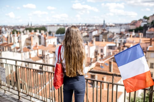 Preview: Woman with french flag in Lyon