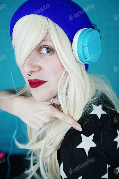 Preview: Beautiful blonde woman listening to music