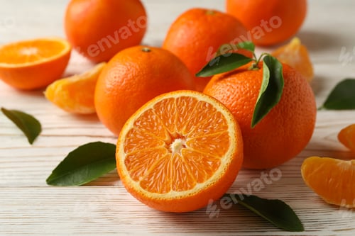 Preview: Ripe sweet mandarins on white wooden background, top view