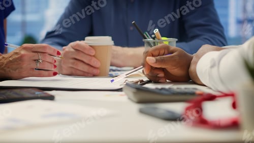 Preview: Senior couple in a modern office meeting with financial planner