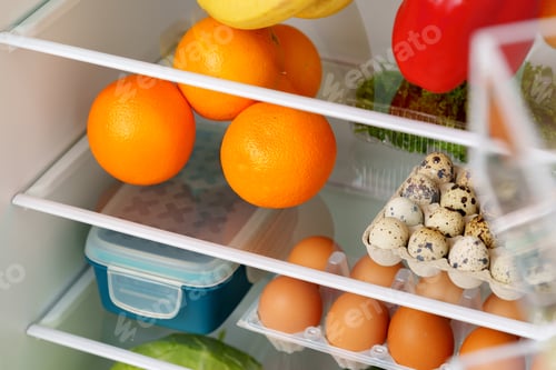 Preview: Well-Stocked Refrigerator With Fresh Produce, Eggs, and Other Groceries