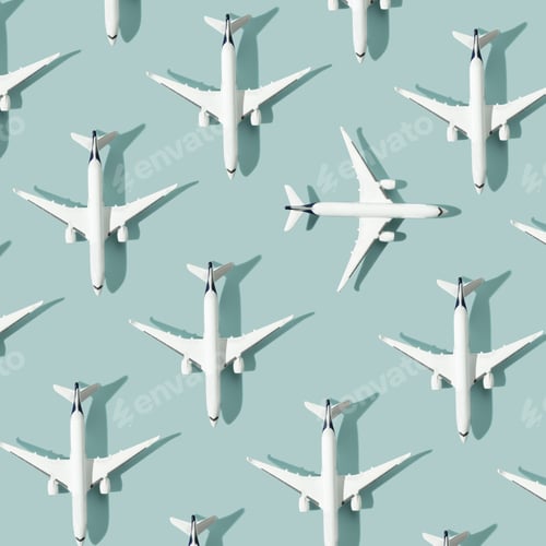 Preview: Creative composition made with passenger plane on blue background