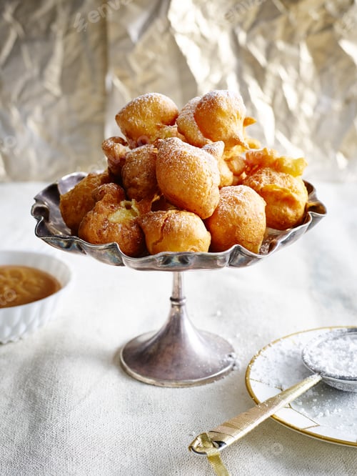 Delicious Fried Dough Balls with Powdered Sugar