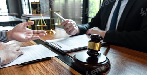 Preview: Professional male lawyer or counselor discussing negotiation legal case with client meeting with
