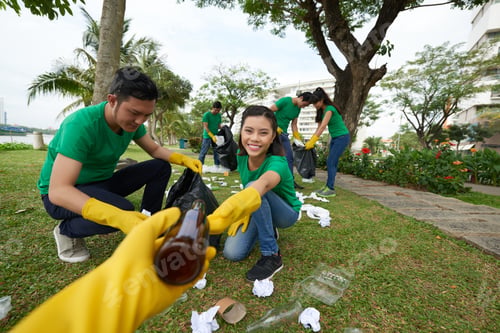 Preview: Environmental activist picking up rubbish