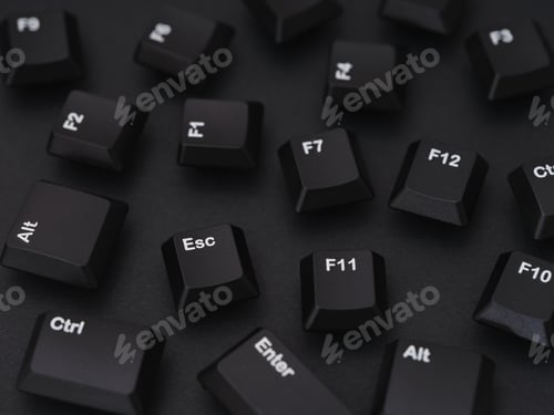 Preview: Black computer keys scattered on a black background