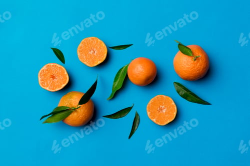 Preview: Many fresh ripe mandarin as colored background, top view. Elegant background