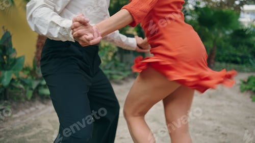 Preview: Hot street dancers performing latin american choreography in city park close up