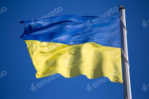 Preview: National flag of Ukraine against blue sky