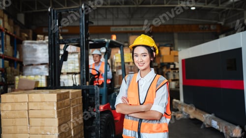 Preview: Warehouse worker checking the quantity of storage products on the shelf in the warehouse.