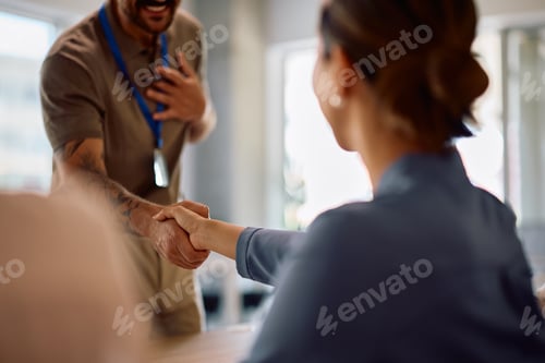 Preview: Close up of colleagues handshaking on a business meeting in the office.