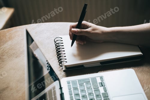 Preview: Writing in a notebook