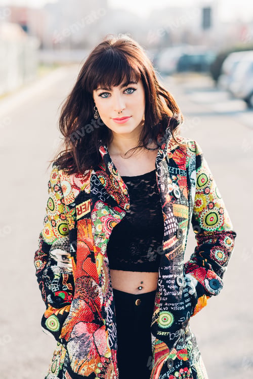 Preview: Young beautiful woman walking outdoor city