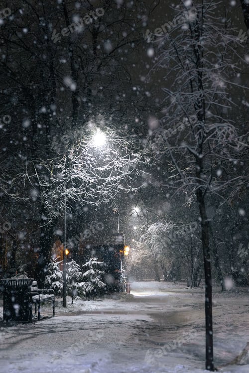 Preview: a street light sitting on top of a snow covered ground