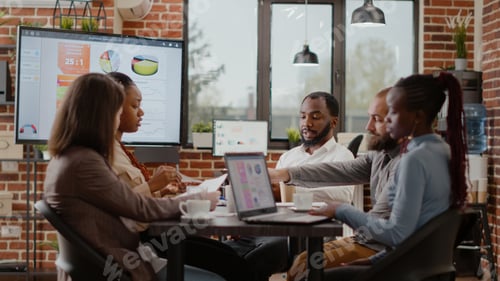 Preview: Business people working together to plan marketing project
