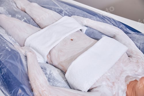 Preview: Body of young woman during professional spa treatment