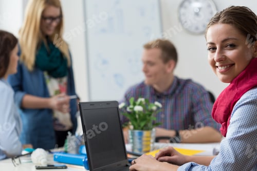 Preview: Portait Of Smiling Young Intern At Office