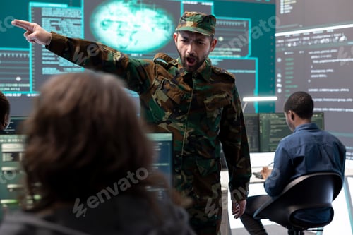 Preview: Military IT experts working on cyber security in a high tech government office