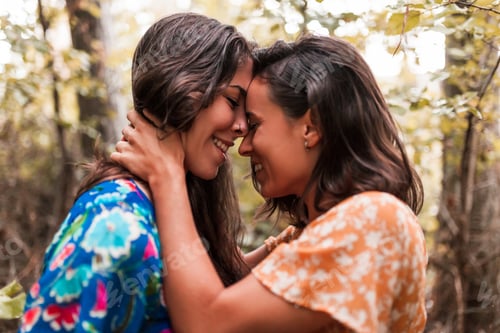 Preview: Two young lesbians caressing each other in the woods