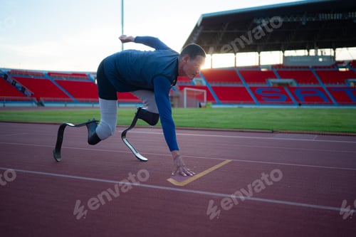 Preview: Disabled athletes prepare in starting position ready to run on stadium track