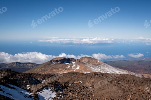 Preview: View over the mountain peaks with the sea in the background