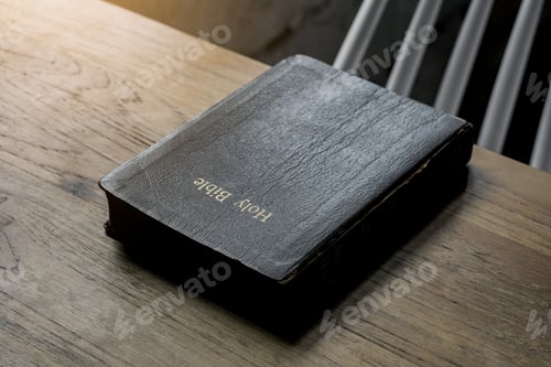 Preview: The Holy Bible is on a wooden table.Religion concept