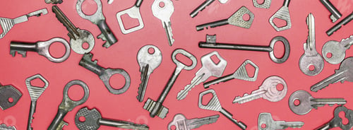 Preview: Keys set on pink background. Door lock keys and safes for proper