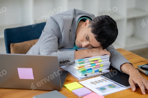 Preview: Startup businessman working and having body aches due to hard work, office syndrome, company executi