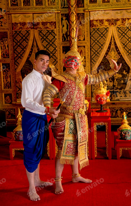 Preview: Asian man with Thai style cloth action of teaching to man wear ancient traditional Thai pattern